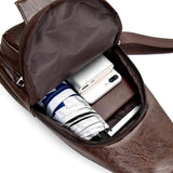 Load image into Gallery viewer, Inside of Leather Crossbody Sling Chest Bag w/ USB Charge Port